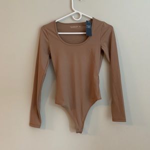Tan/Brown women’s long sleeve bodysuit
